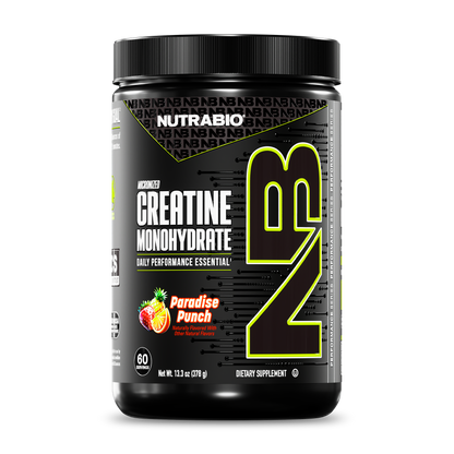 A black NutraBio Creatine Monohydrate Powder container with bold yellow NB lettering offers 13.23 oz (375 g) of micronized creatine in Paradise Punch flavor as a dietary supplement.