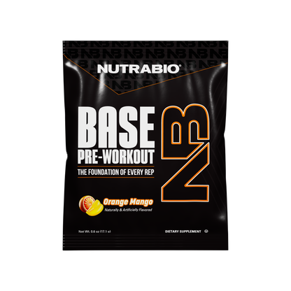 The NutraBio Base Pre-Workout - Sample Packet features bold white and orange text and an orange mango flavor icon on the black packet, delivering powerful workout energy for enhanced muscle pumps.