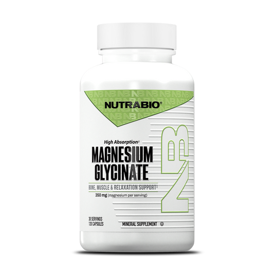 A white NutraBio Magnesium Glycinate bottle with a green and black label offers highly absorbable magnesium for bone health and muscle relaxation, featuring 120 capsules on the front.